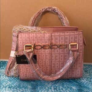 Bebe Pink Satchel with Gold Hardware and Monogram Design